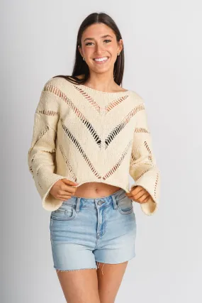 Distressed crop sweater natural